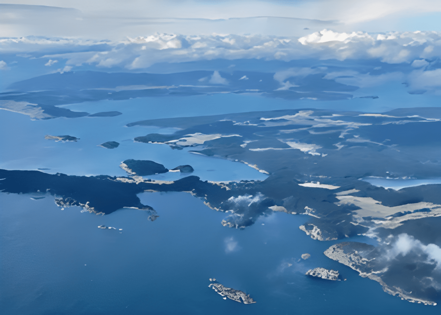 Aerial view of coastal islands and sea.